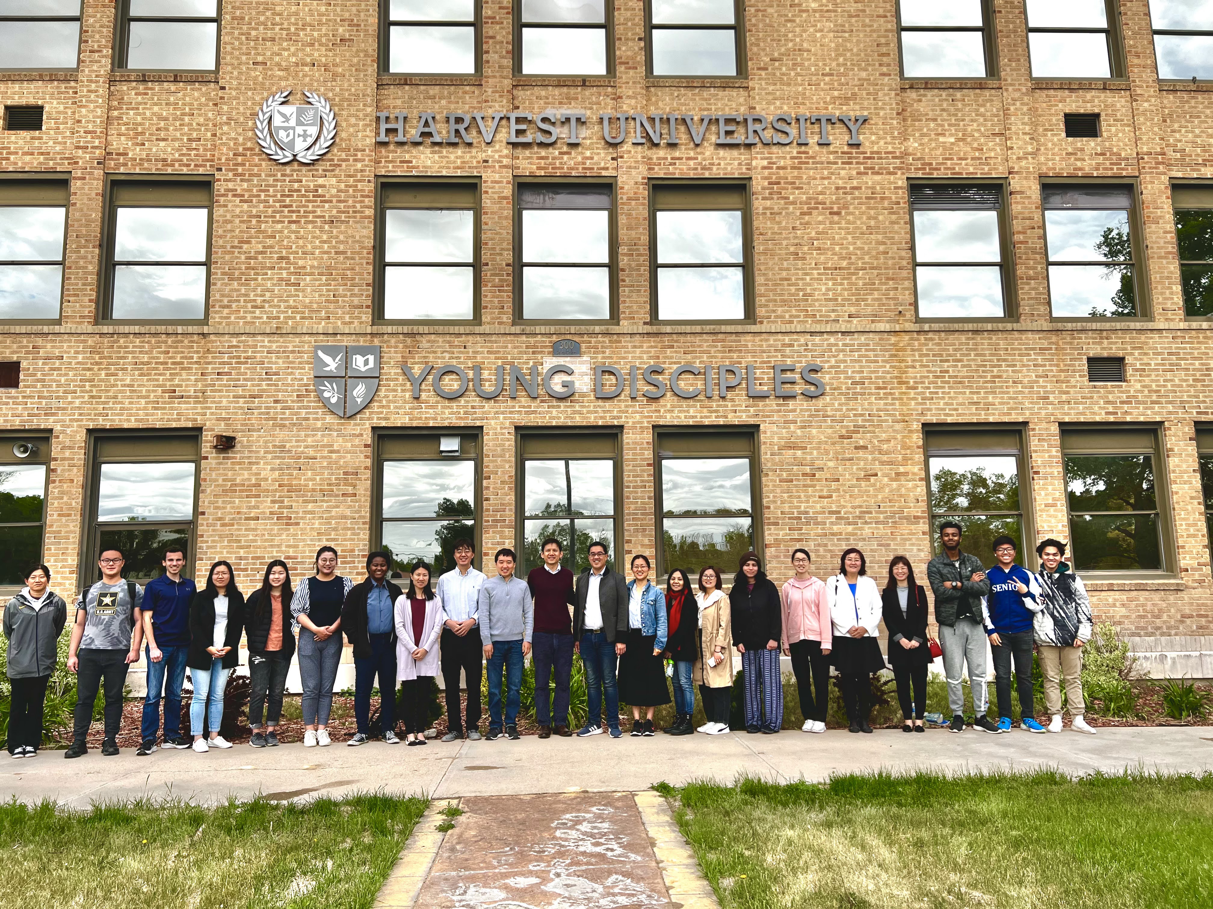 A group of Young Disciples students gathered together on campus